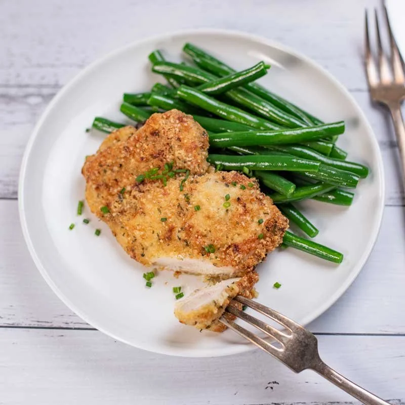 Keto Breaded Chicken Thighs cooked in a ranch-style seasoning