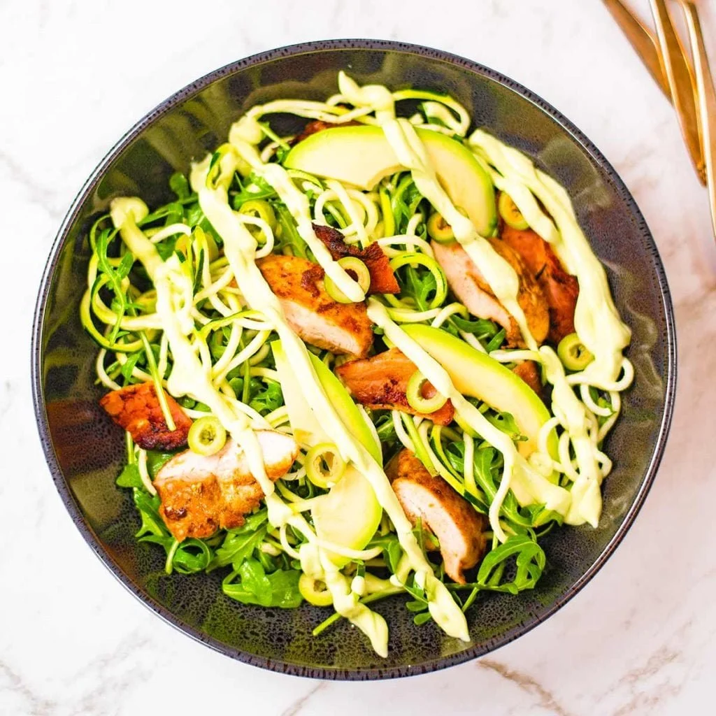 Healthy Keto Chicken Zoodles Salad with fresh vegetables and flavorful dressing